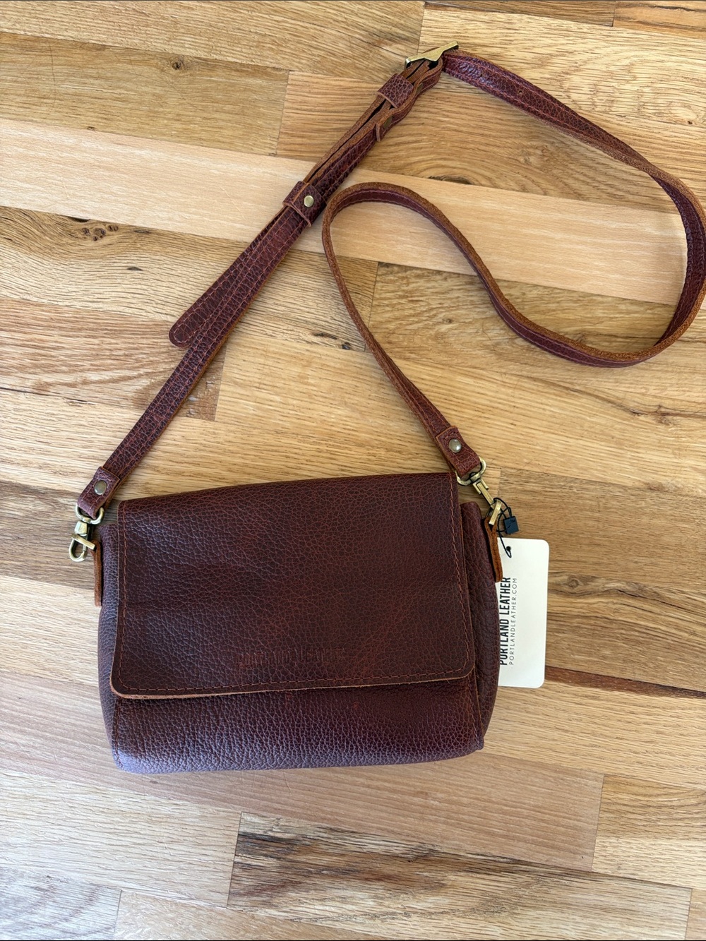 NWT Portland Leather Metro Crossbody color nutmeg